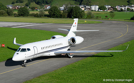 Dassault Falcon 6X | HB-JTO | untitled (Cat Aviation)  |  This Dassault Falcon 6 is taxing in front of the former alert shelters at Buochs. | BUOCHS (LSZC/BXO) 25.08.2025