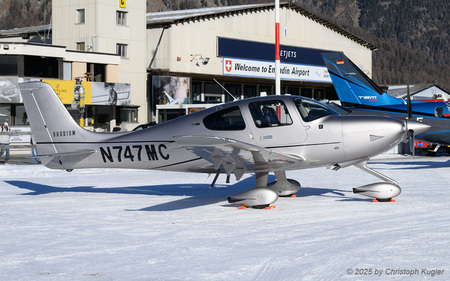 Cirrus SR22T | N747MC | private  |  This Cirrus SR22 is parked on the snow parking at Samaden. It arrived earlier that day from Speyer. | SAMEDAN (LSZS/SMV) 27.12.2025