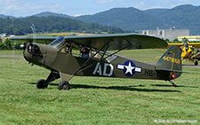 Piper L-4H Grasshopper | HB-OSM | private  |  This Piper L-4H Grasshopper is seen here taxing towards the visitors parking. | BIRRFELD (LSZF/---) 28.06.2025