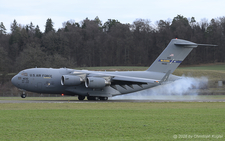 Boeing C-17A Globemaster III | 04-4130 | US Air Force  |  This Boeing C-17A Globemaster III is touching down on runway 29 at Dubendorf after a long flight from Bangor, MA. It was transporting one of the Presidential's helicopter.  | D&UUML;BENDORF (LSMD/---) 15.01.2026