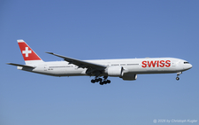 Boeing 777-300ER | HB-JNJ | Swiss International Air Lines  |  Transparent AeroSHARK film has been applied on this aircraft fuselage replicates the hydrodynamic skin of a shark to reduce aerodynamic drag and as a consequence inflight fuel consumption. | Z&UUML;RICH (LSZH/ZRH) 23.09.2026